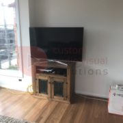 TV on cabinet