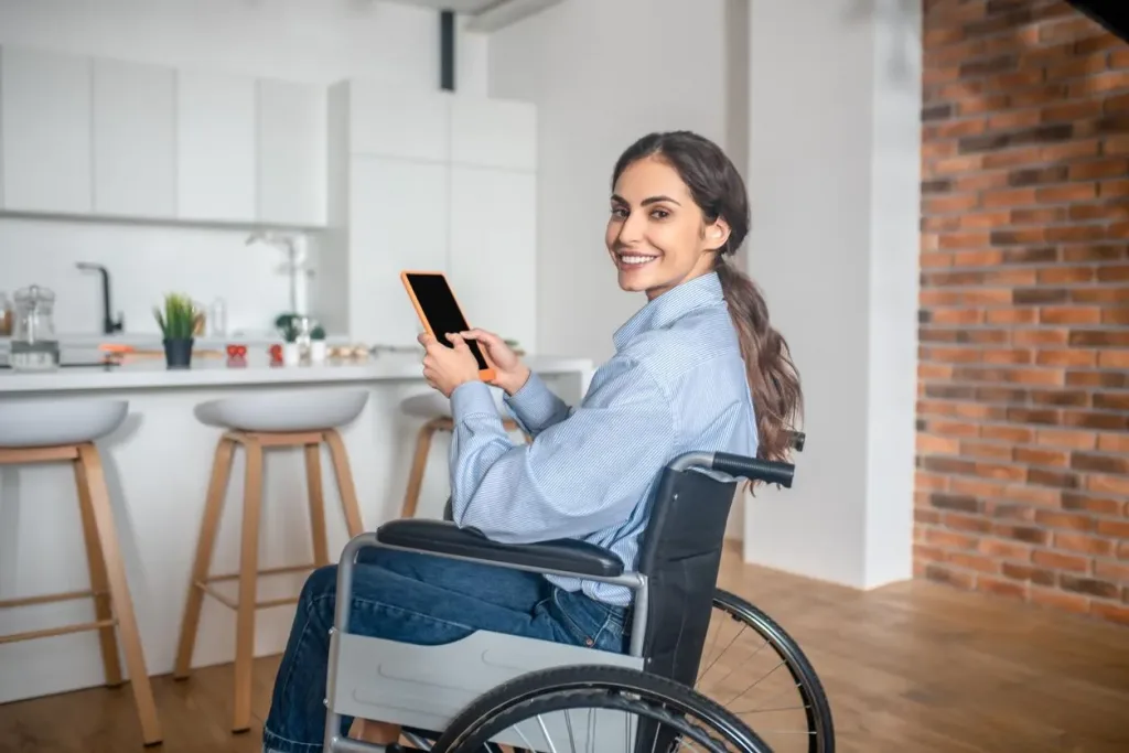 Woman in wheel chair - assisted living home automation
